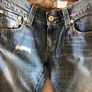 Levi’s 504 Slouch Straight with turquoise button